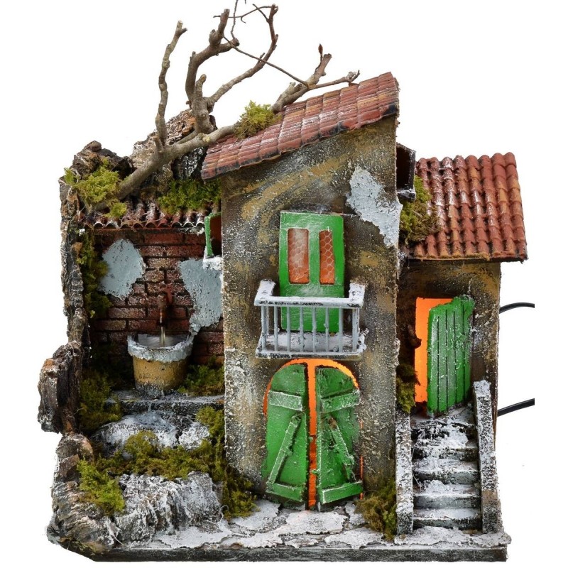 Illuminated house with functioning fountain cm 30x21x35 h