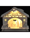 Wooden hut illuminated with Nativity and stylized characters