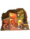 Illuminated nativity scene complete with Landi statues with