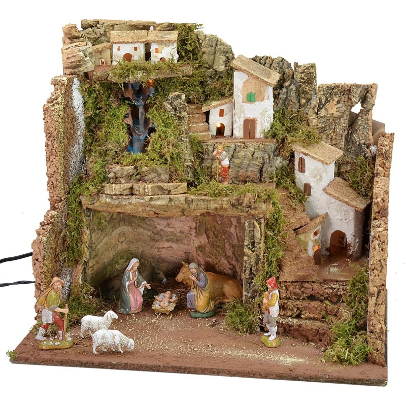 Illuminated nativity scene complete with Landi statues with