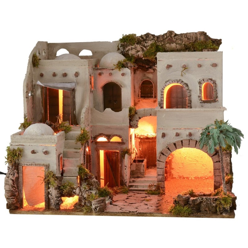 Pueblo árabe iluminado con oasis y fuente cm