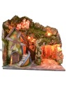 Classic illuminated landscape with grotto and mill running on