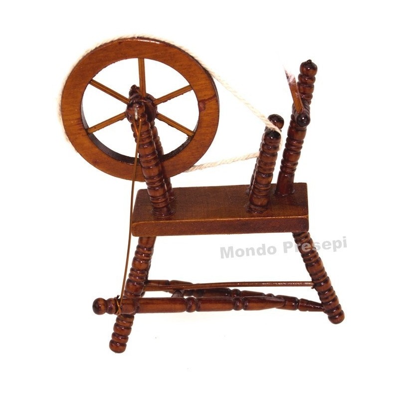 Painted wooden spinning wheel 6,5x9 h.