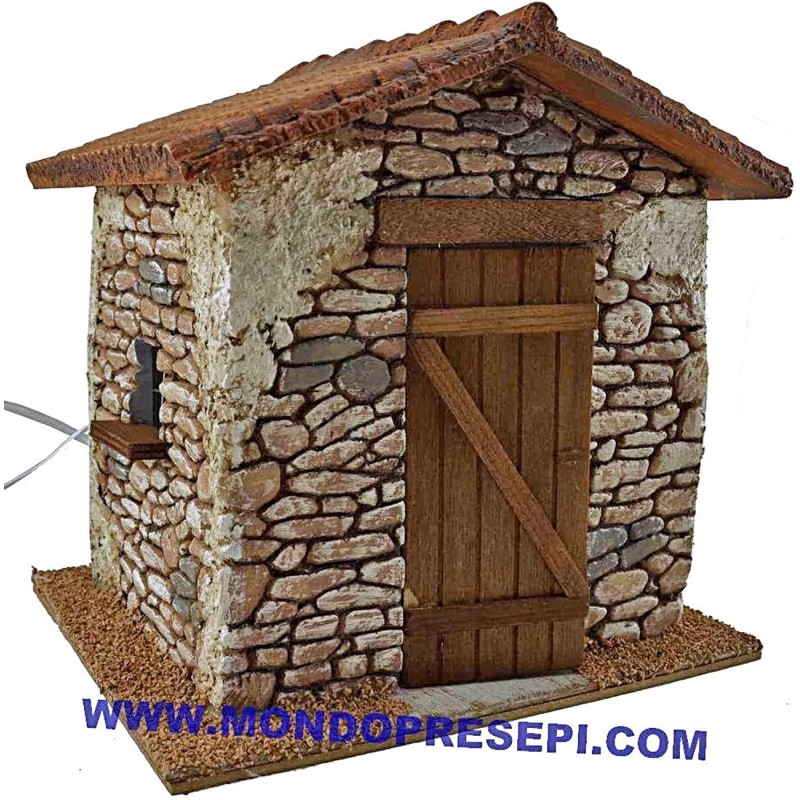 Casa de piedra con humo cm 25x22x24 h. Mundo