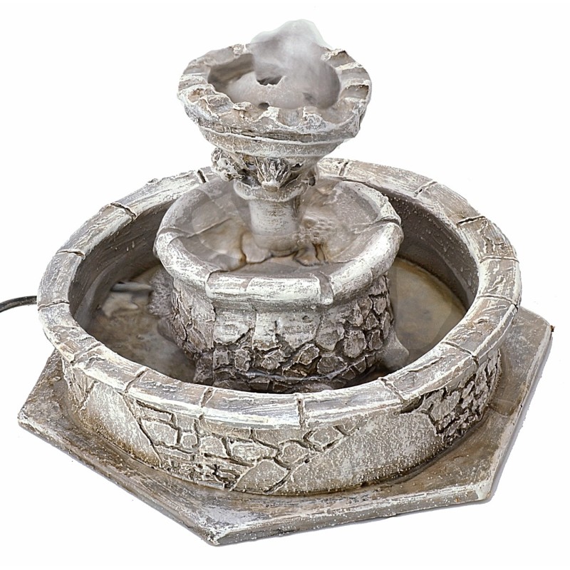 Circular resin fountain with functioning water movement