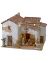 Illuminated stucco village complete with figurines cm 40x30x31 h