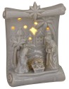 Natividad y pergamino de porcelana con luz de 10x6,5x14 cm h.