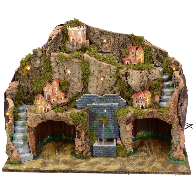 Illuminated nativity scene with functioning fountain and grotto