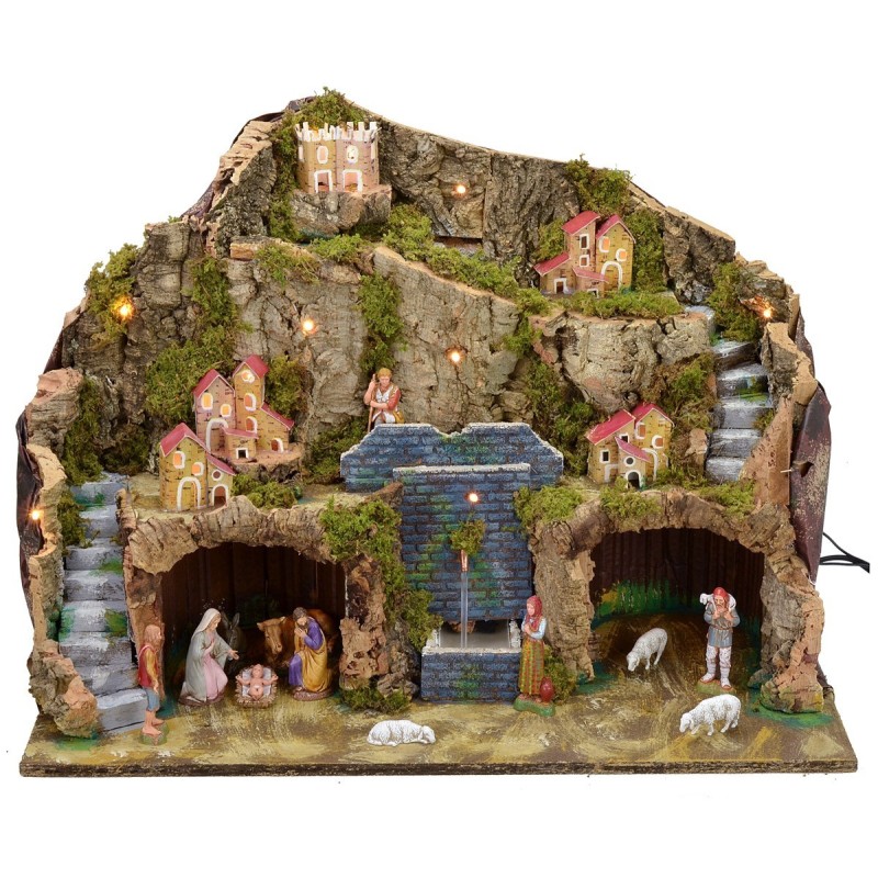 Presepe illuminato con fontana funzionante e grotta completo di