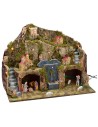 Illuminated nativity scene with working fountain and grotto complete with