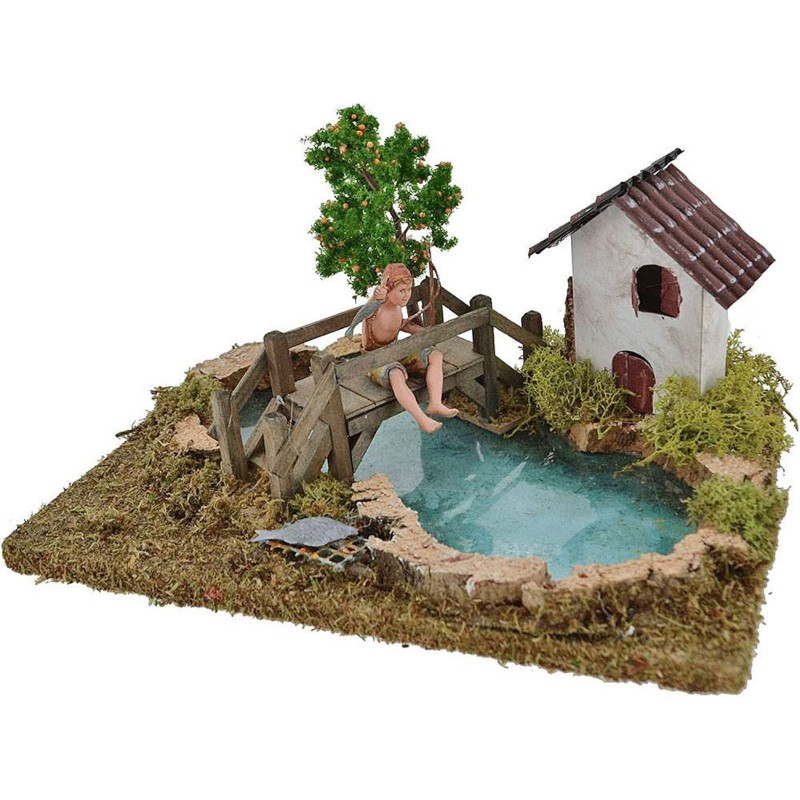 Estanque con efecto de profundidad, pescador Landi, árbol y casa.