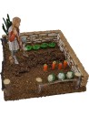 Vegetable garden with farmer landi spade
