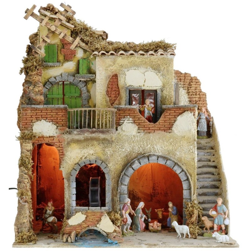 Illuminated nativity scene complete with Landi statues with