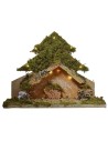 Tree with light-illuminated hut with piles of batteries cm