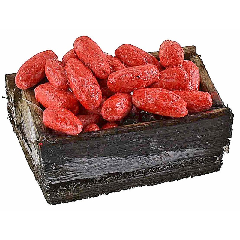 Caja de madera con tomates de 3,4x2x1,4 cm de altura.