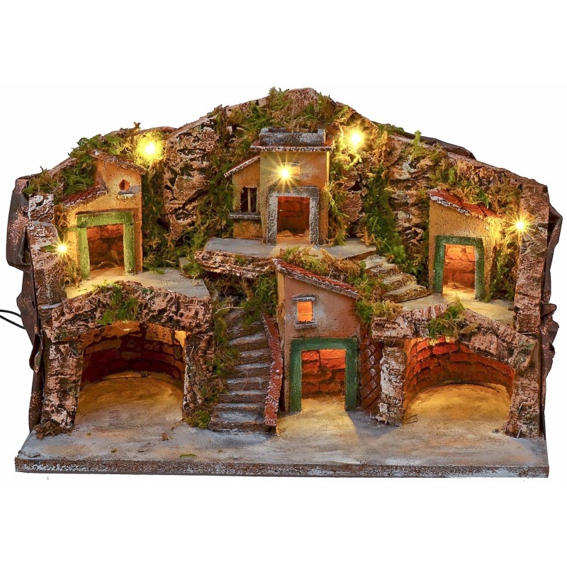 Illuminated nativity scene with two caves and central staircase cm