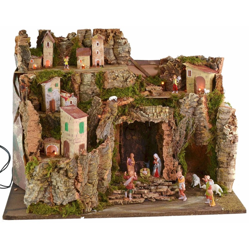 Illuminated nativity scene with central cave complete with figurines cm