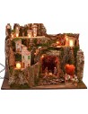 Illuminated nativity scene with central cave complete with figurines cm