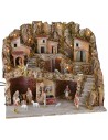 Illuminated nativity scene with caves and working fountain