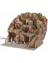 Illuminated nativity scene with caves and working fountain