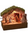 Illuminated hut with Nativity and moving bagpipe player cm