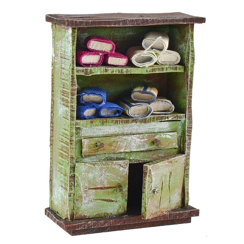 Cabinet with fabric remnants, dimensions 8.5x3.5x12 cm (height), wood