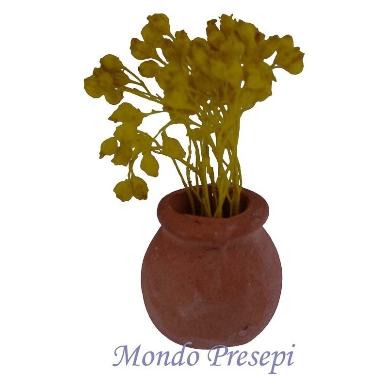 Terracotta vase with yellow flowers