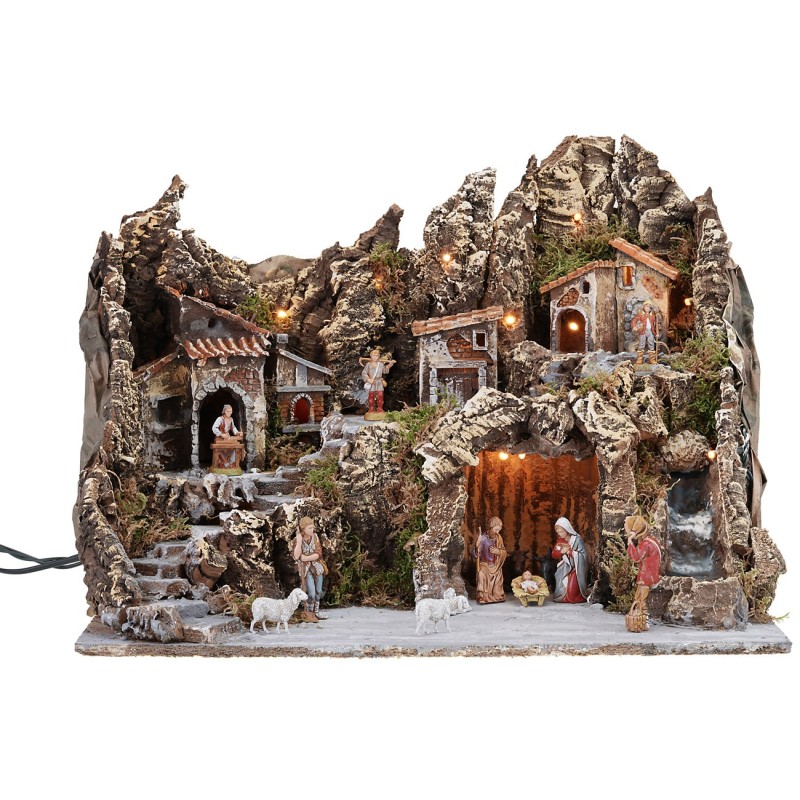 Illuminated nativity scene with working oven and waterfall, complete with