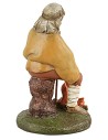 Shepherd with staff sitting in front of the fire in painted resin