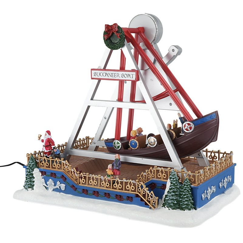 Carrusel navideño con barco oscilante completo de luces y música.