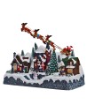 Christmas scene with Santa Claus on a sleigh pulled by reindeer