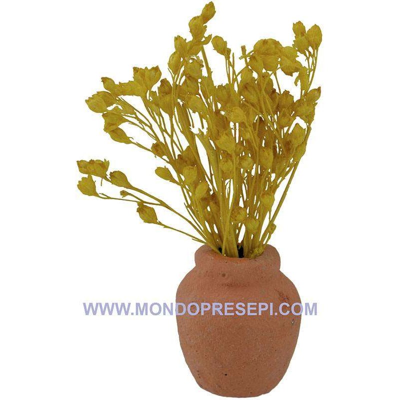 Terracotta vase with yellow flowers